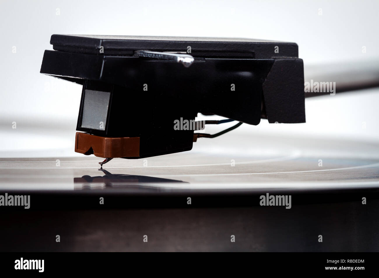Close up of turntable needle on a vinyl record. Turntable playing vinyl