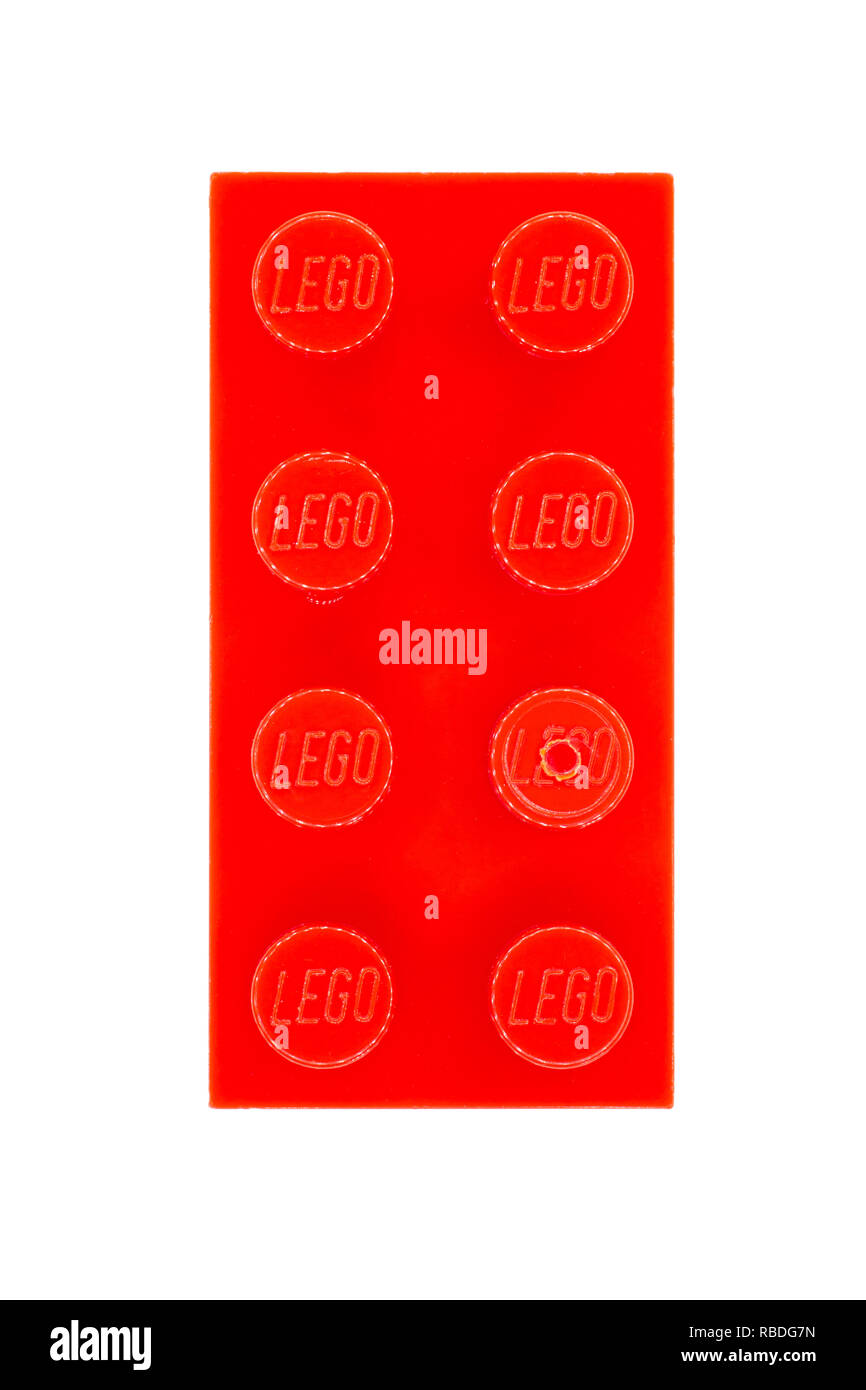 A red 4x2 Lego brick Stock Photo