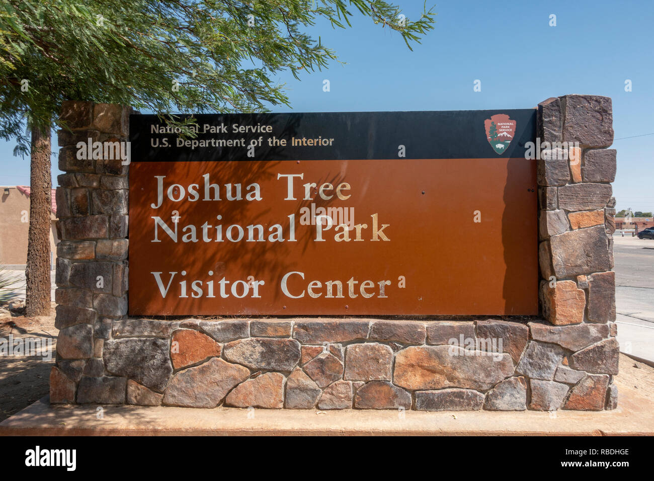 The National Park Service sign at the entrance to the Joshua Tree National Park Visitor Center, California, United States. Stock Photo