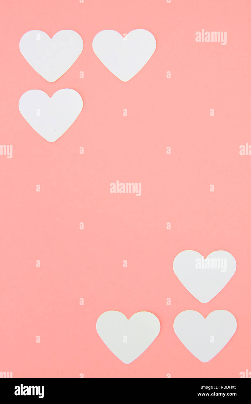 White paper hearts on pink background with copy space Stock Photo - Alamy