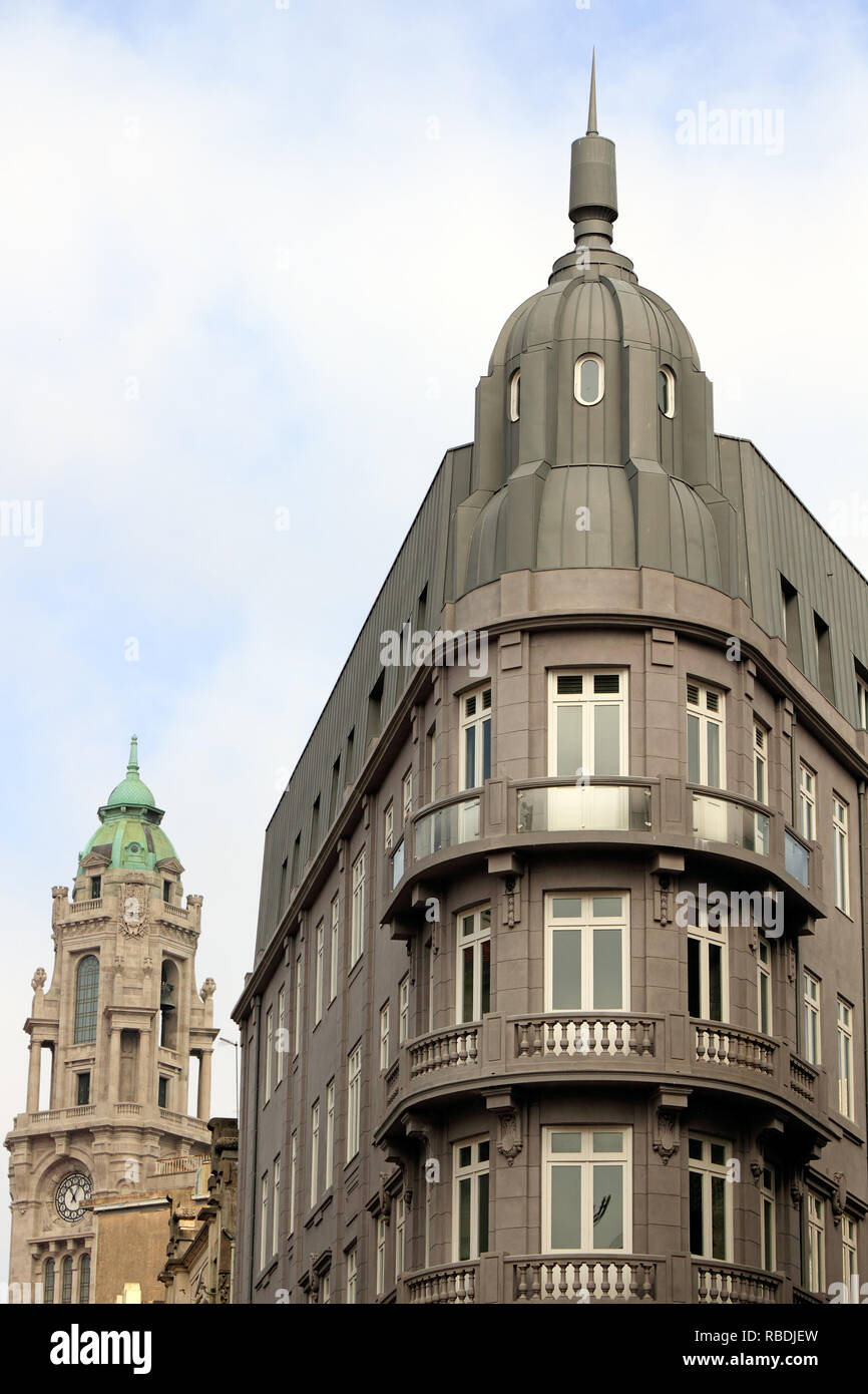 Interesting perspective of architecture of Porto seeing in 2nd plane the tower of the city  hall, Portugal Stock Photo