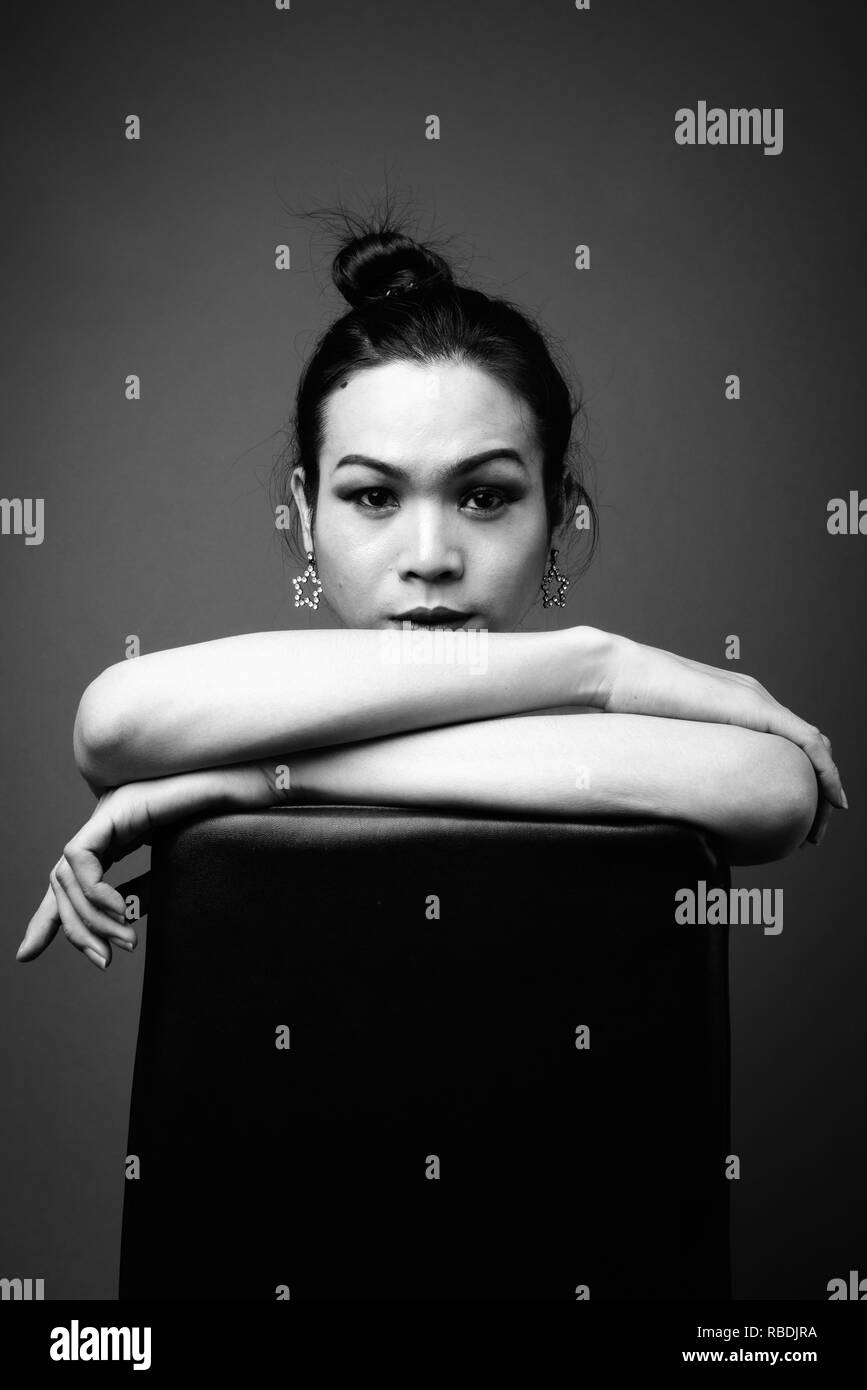 Young beautiful Asian transgender woman in black and white Stock Photo
