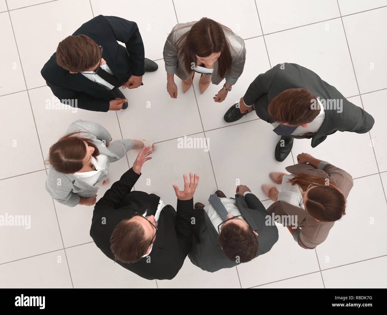 top view.business team talking standing in a circle Stock Photo - Alamy
