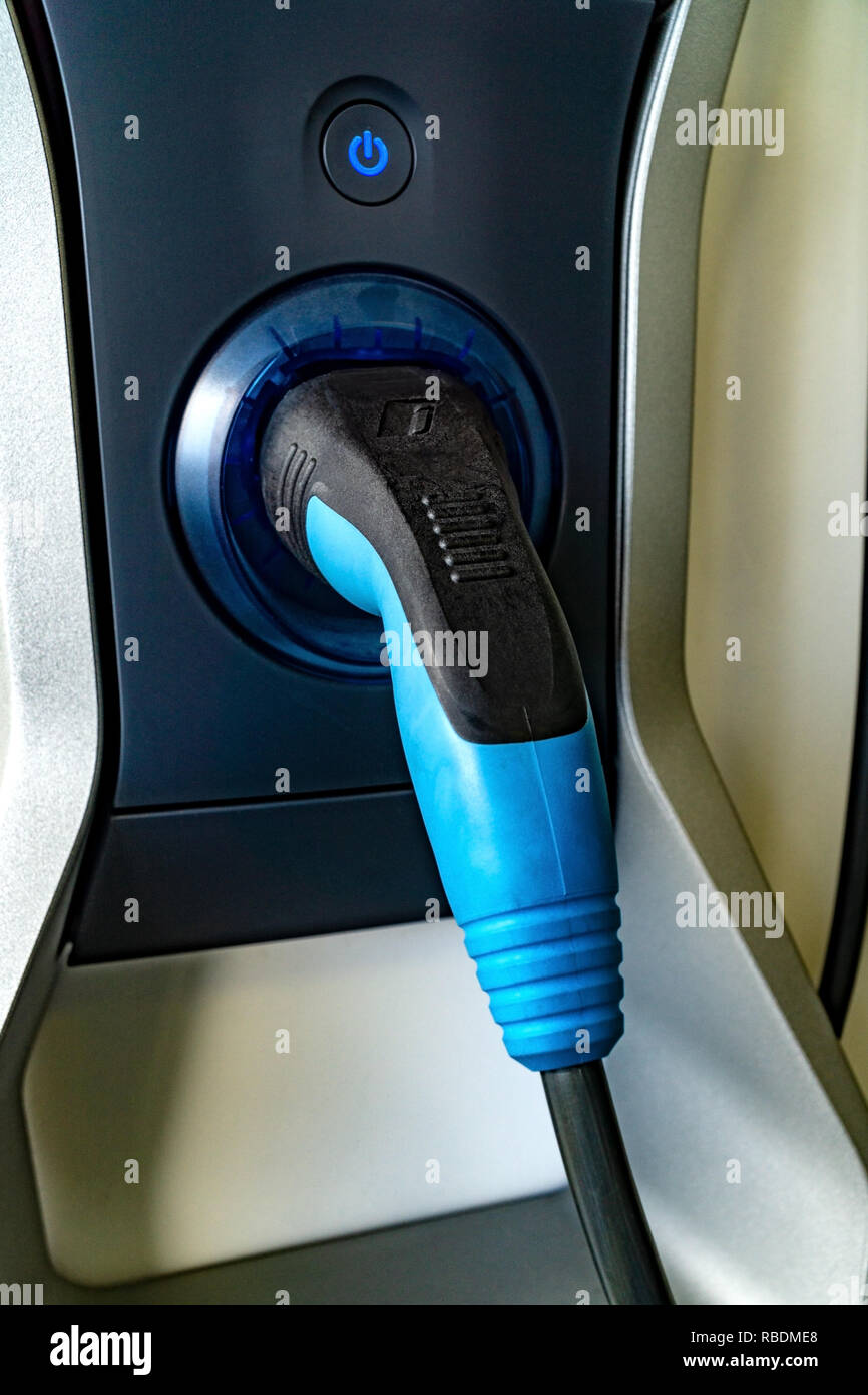 Car electricity charger in detail with Power Button Stock Photo Alamy