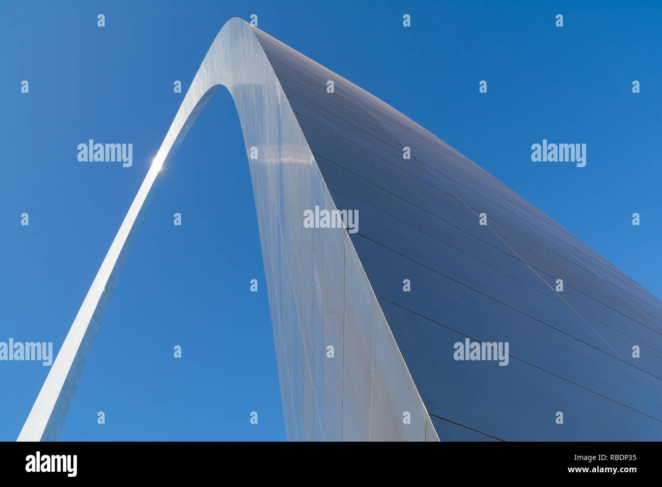 Abstract view of the Gateway Arch with brilliant blue skies in background.  St. Louis, Missouri, USA Stock Photo