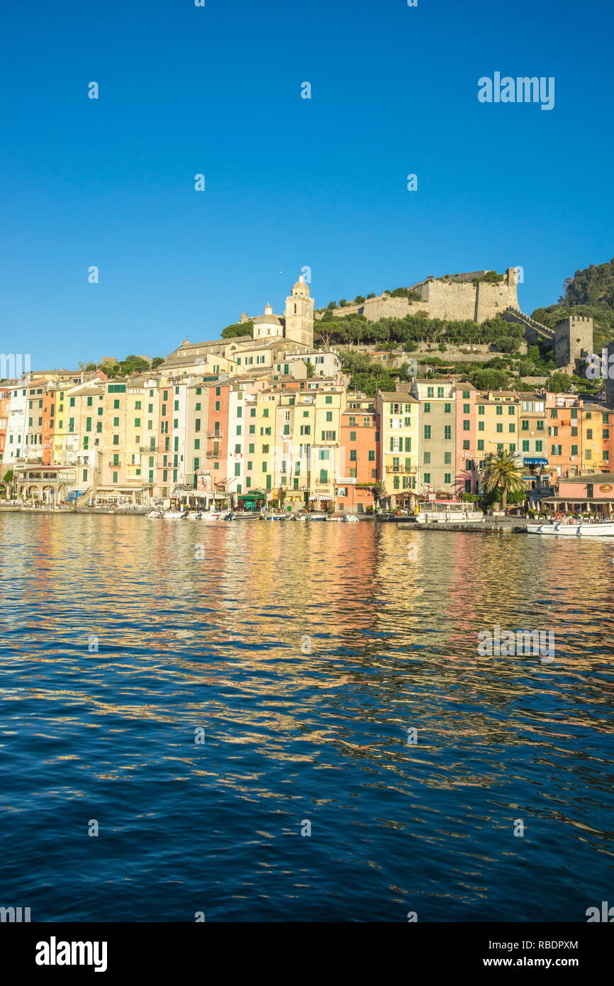 The blue sea frames the typical colored houses of Portovenere La Spezia
