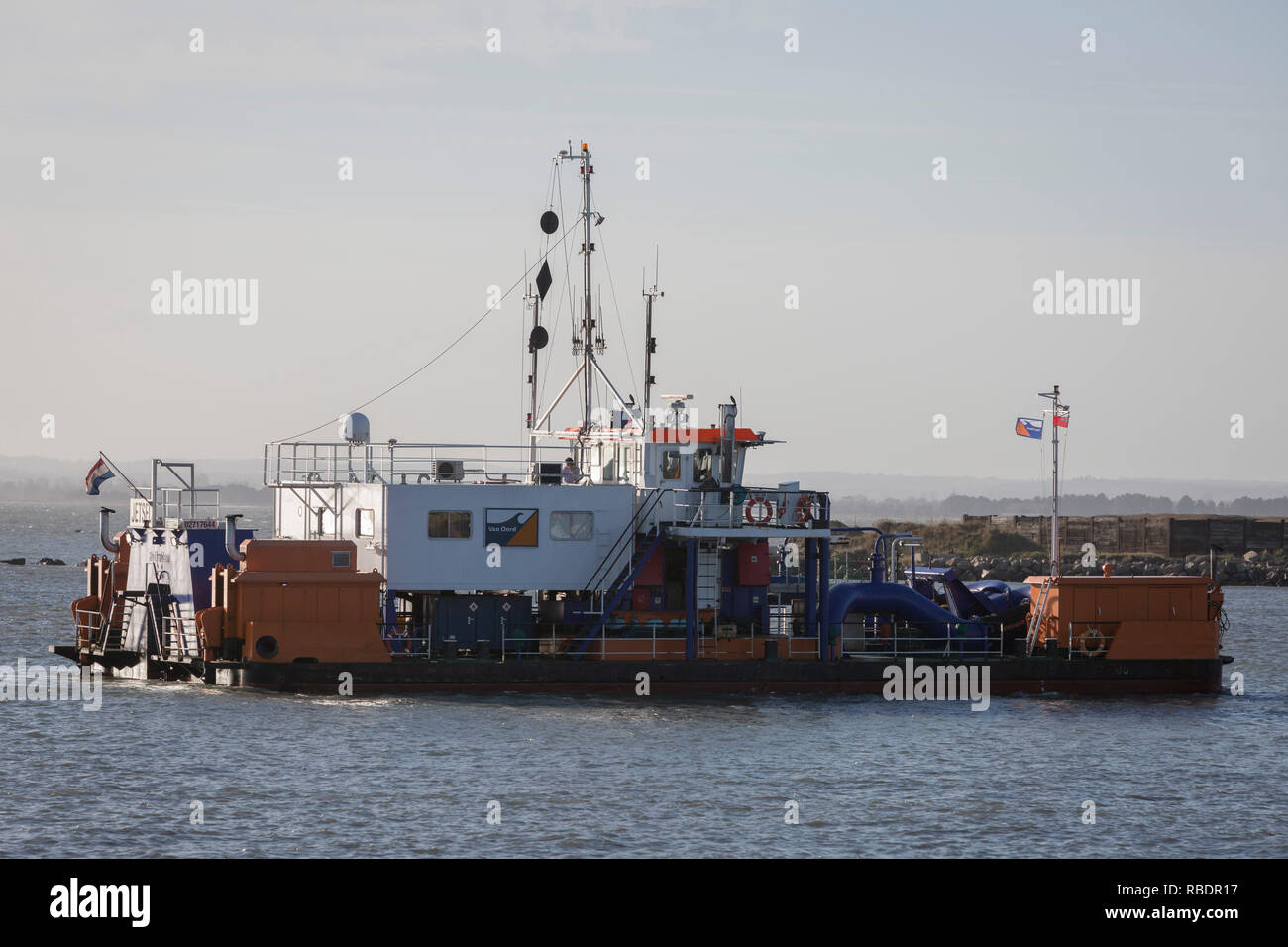 A Dutch-registered dredger works in waters of the Port of Ramsgate, a closed but once busy ferry terminal, on 8th January 2019, in Ramsgate, Kent, England. The Port of Ramsgate has been identified as a 'Brexit Port' by the government of Prime Minister Theresa May, currently negotiating the UK's exit from the EU. Britain's Department of Transport has awarded to an unproven shipping company, Seaborne Freight, to provide run roll-on roll-off ferry services to the road haulage industry between Ostend and the Kent port - in the event of more likely No Deal Brexit. In the EU referendum of 2016, peop Stock Photo