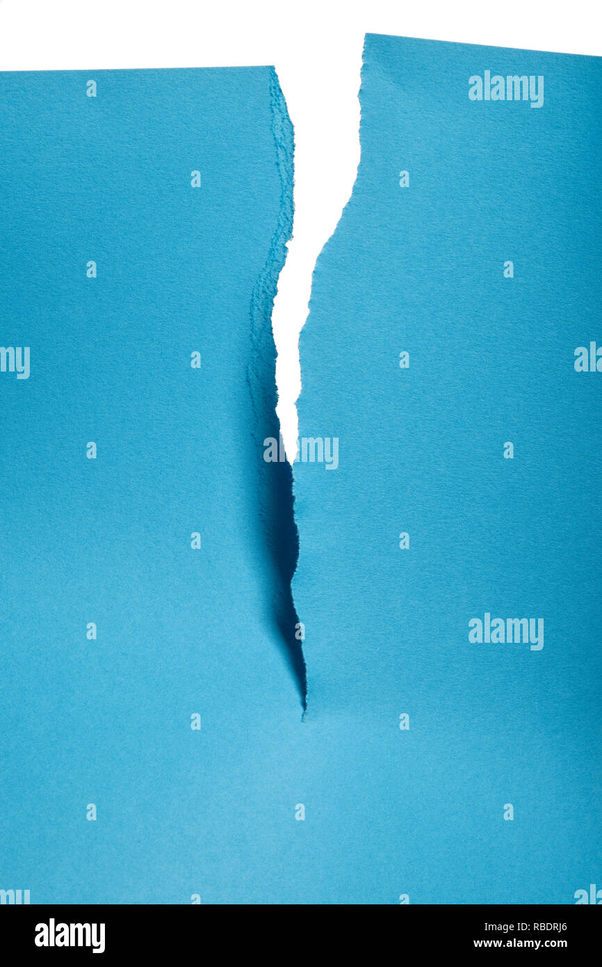 A Piece Of Blue Paper Torn In Half Stock Photo Alamy