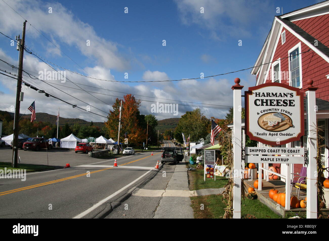Autumn street scene, Sugar Hill, New Hampshire. Pumpkins sit outside