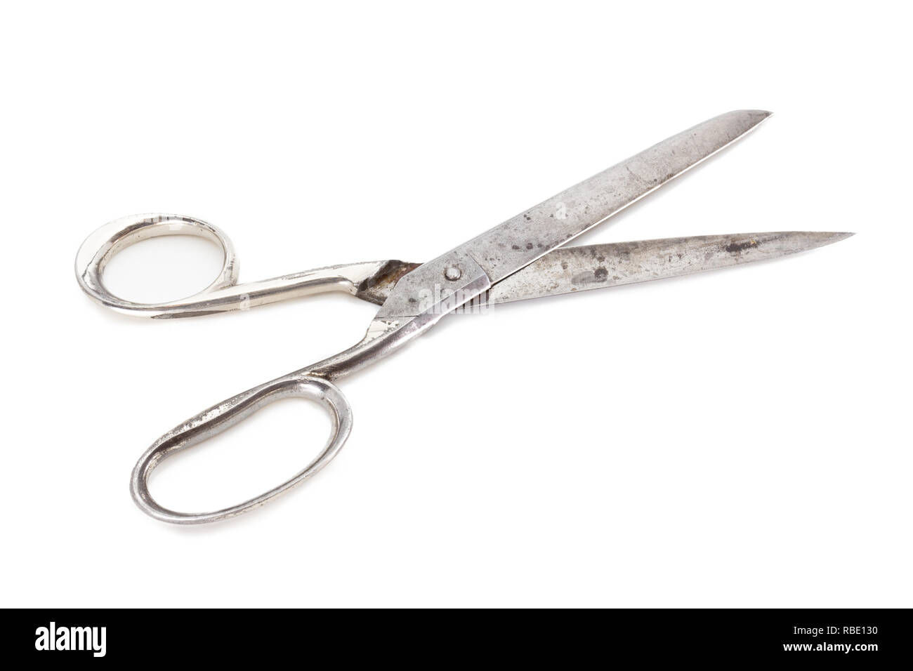Old scissors, isolated on white. Stock Photo