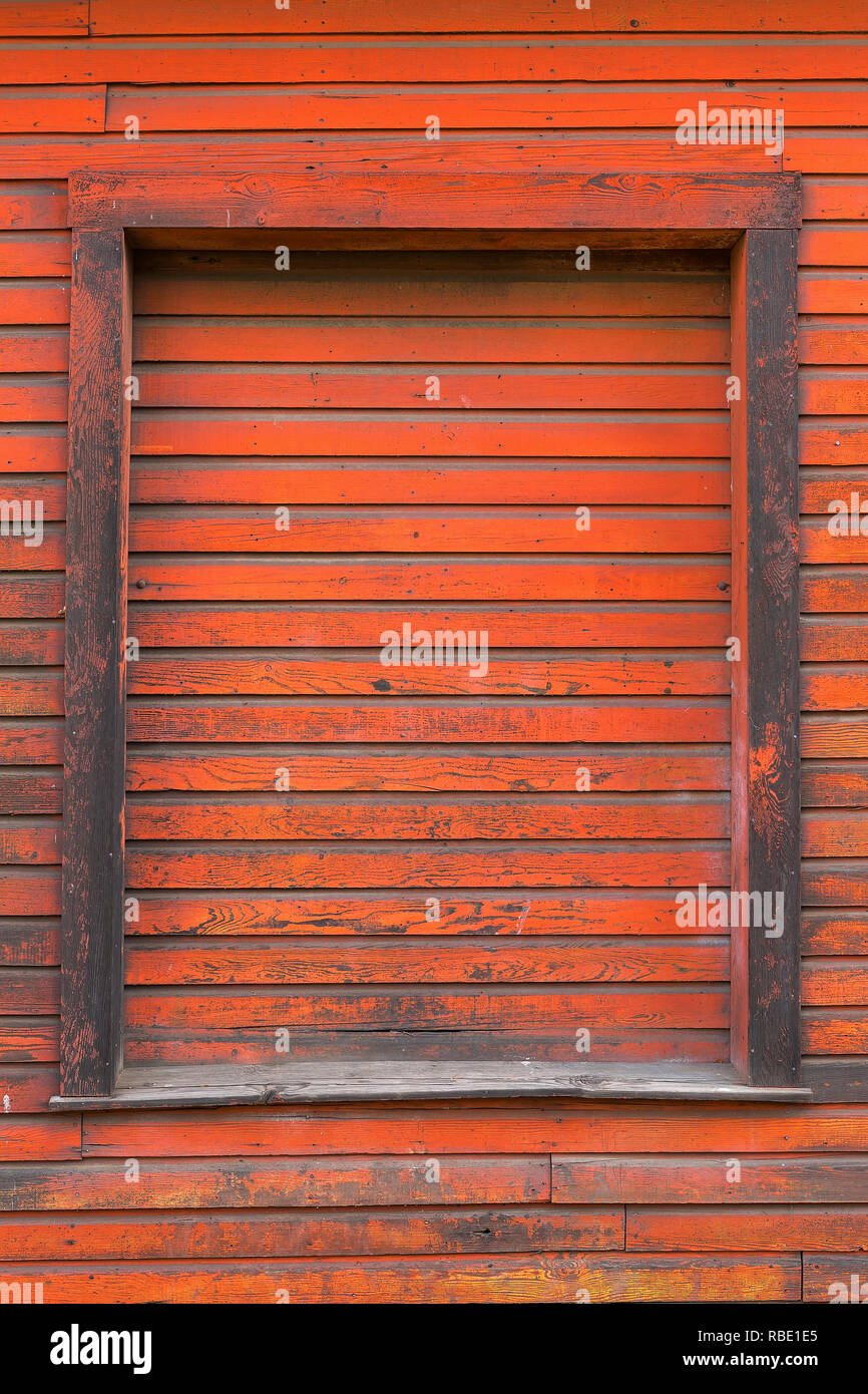 Old red storage warehouse barn door wood exterior siding grunge texture background Stock Photo