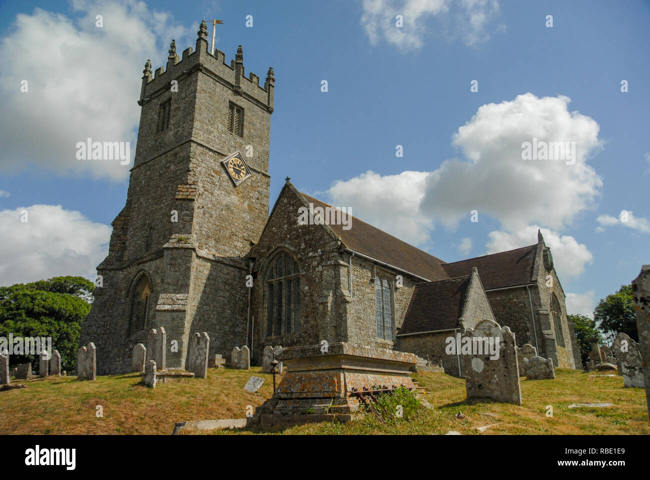 Church builidng and cemetary in Kent UK Stock Photo