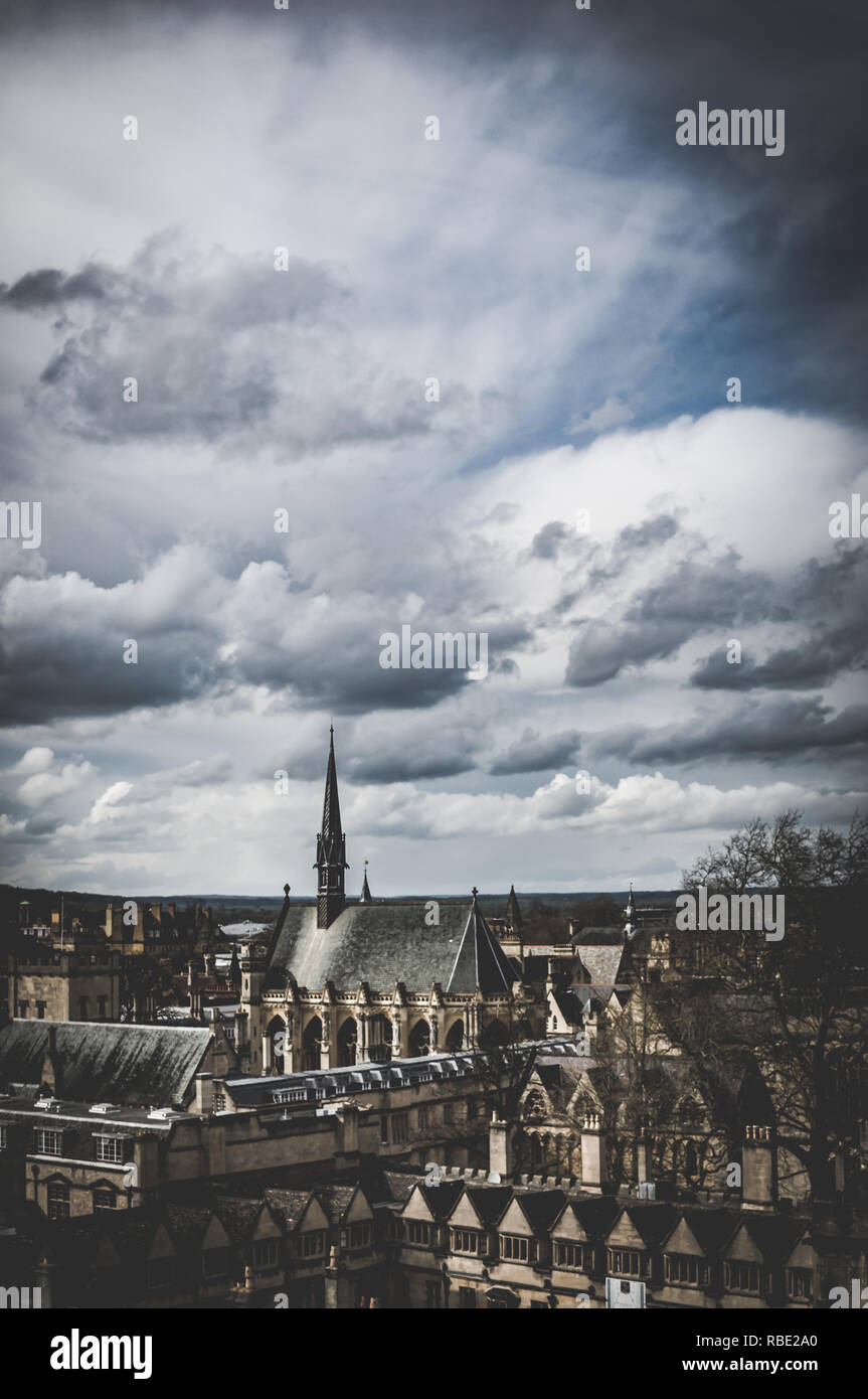 A bird's eye view of the english town Oxford's skyline on a cloudy day in the city. Traditional old buildings with rainy weather - typical of England. Stock Photo