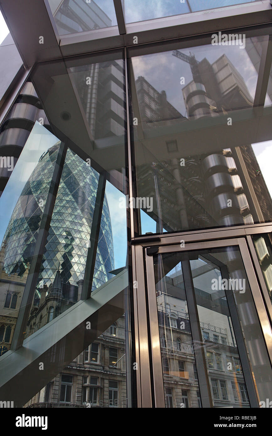 Reflection of Lloyd's building in the glass of The Scalpel, with the Gherkin showing through the other side. Stock Photo