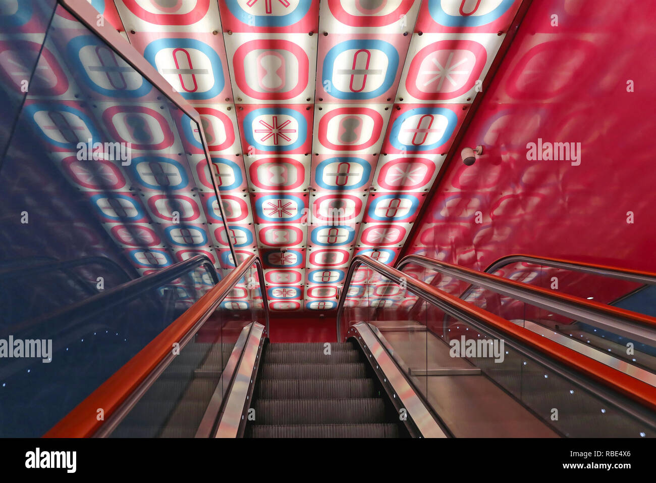 NAPLES, ITALY - JUNE 25: University Metro Station in Naples on JUNE 25, 2014. Escalators in Universita Art Station Designed by Architect Karim Rashid  Stock Photo