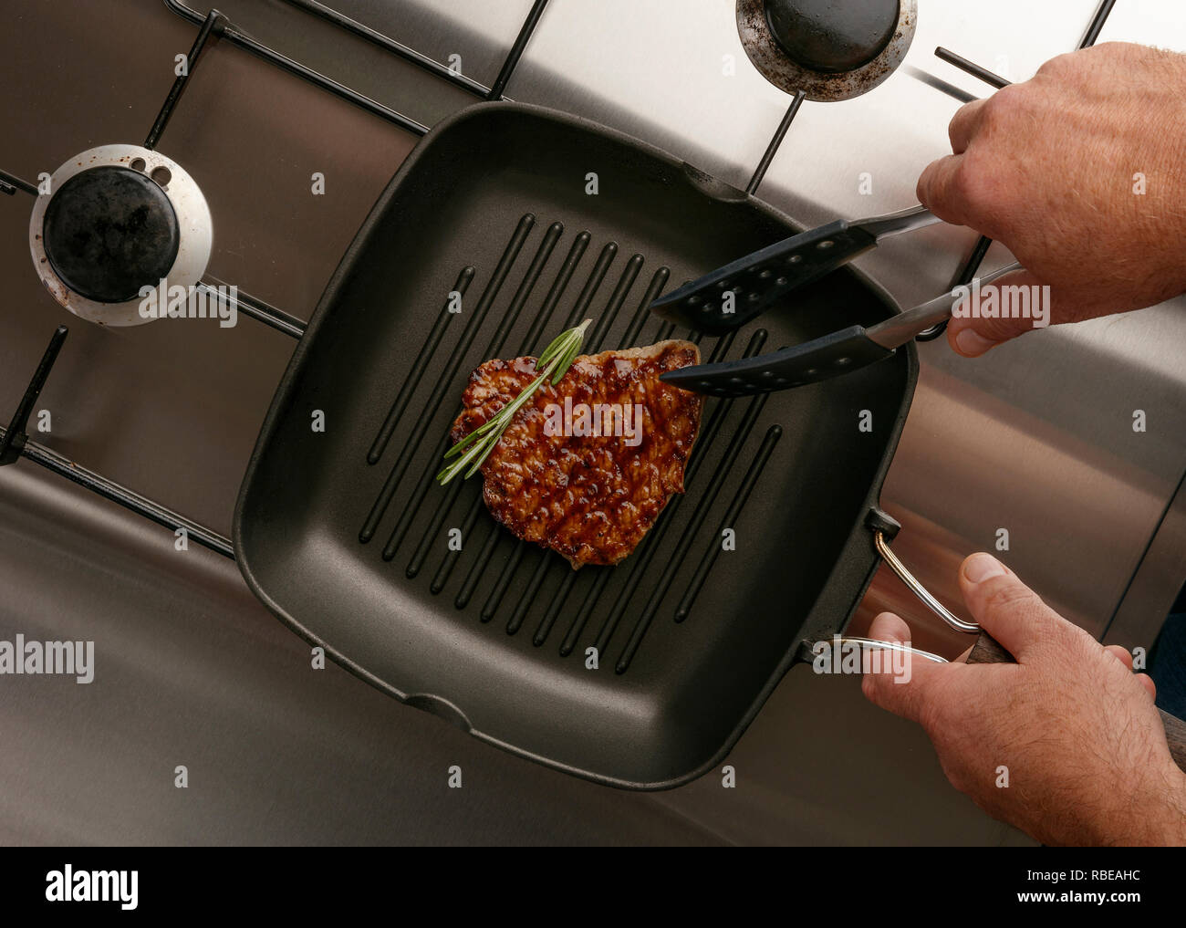 Steak griddle tongs hires stock photography and images Alamy