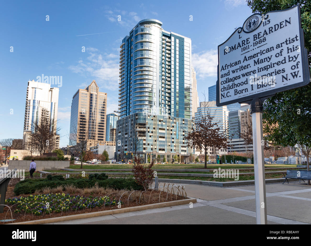 CHARLOTTE, NC, USA-1/8/19: Romare Bearden Park & informational sign about the artist for whom the park was named. Stock Photo