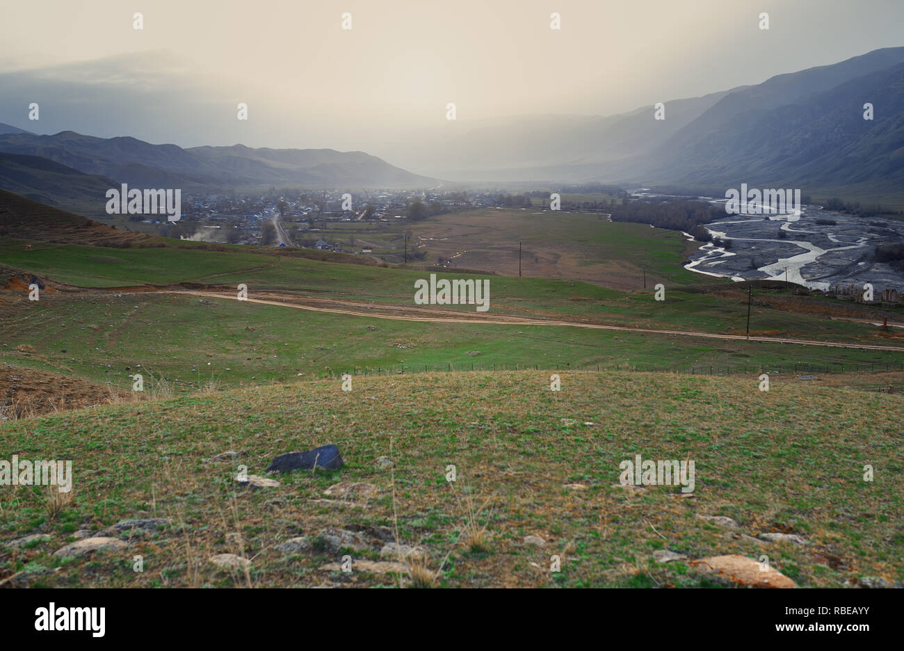 Mountain village in the mountain valley Stock Photo - Alamy