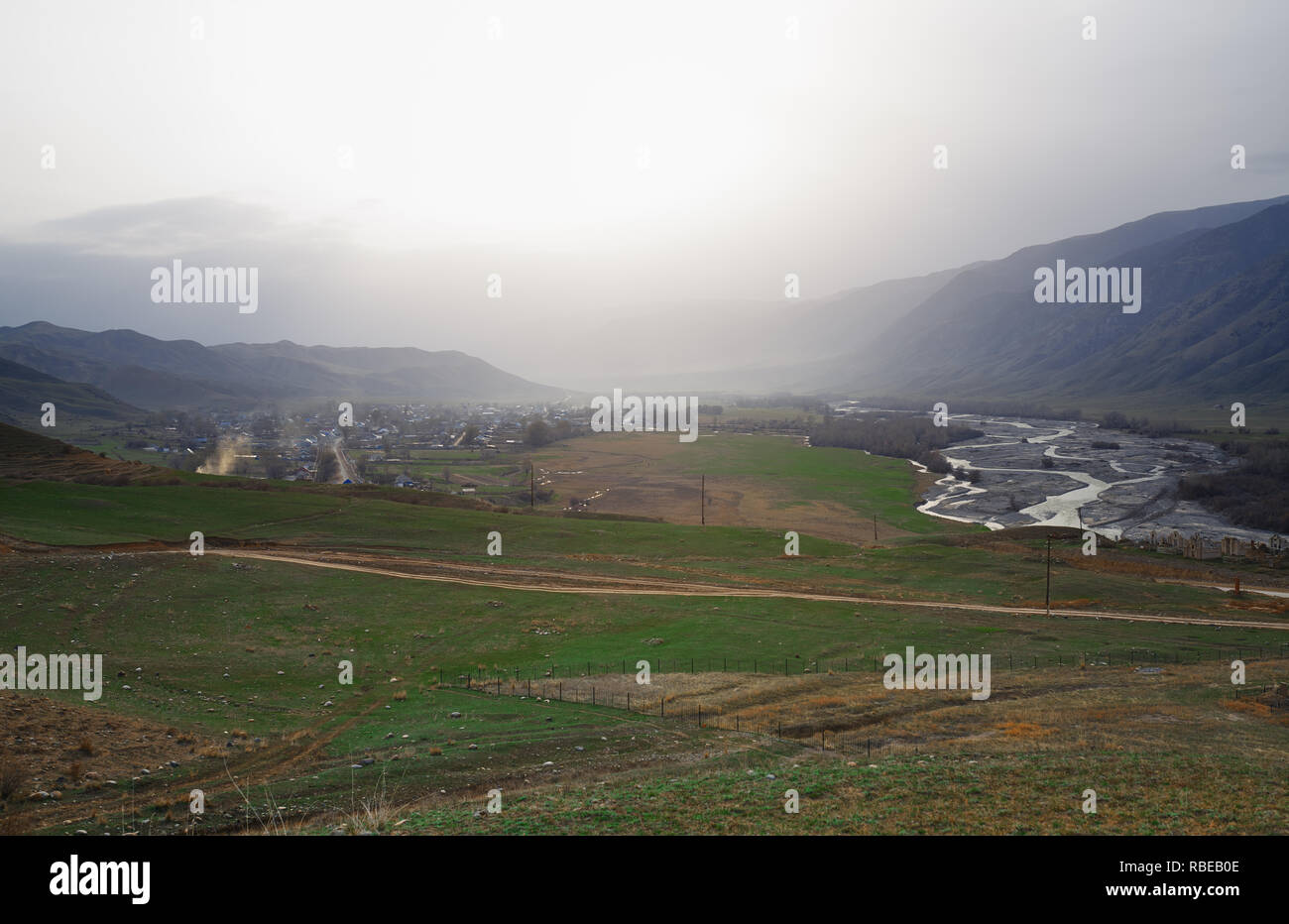 Mountain village in the mountain valley Stock Photo - Alamy