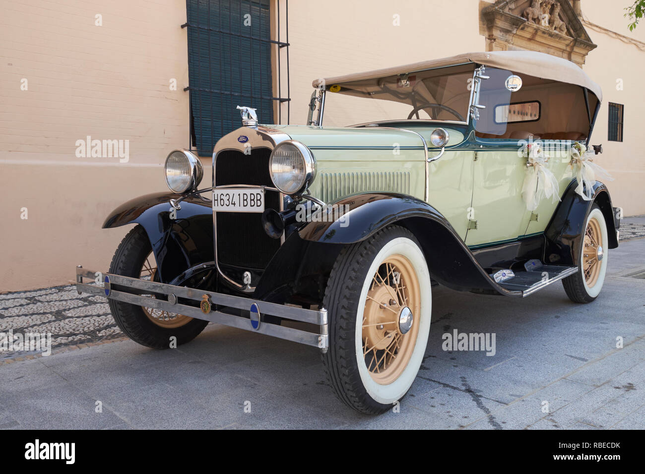 A 1930 Ford Model A motorcar used for a wedding. Castilleja de la Cuesta, Seville, Spain. Stock Photo