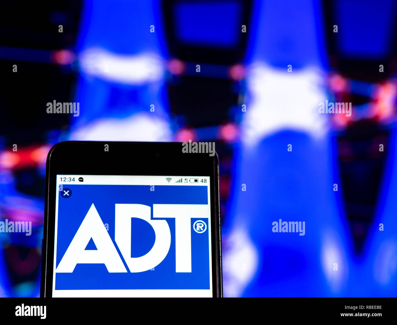 ADT Security Services, Security company logo seen displayed on smart