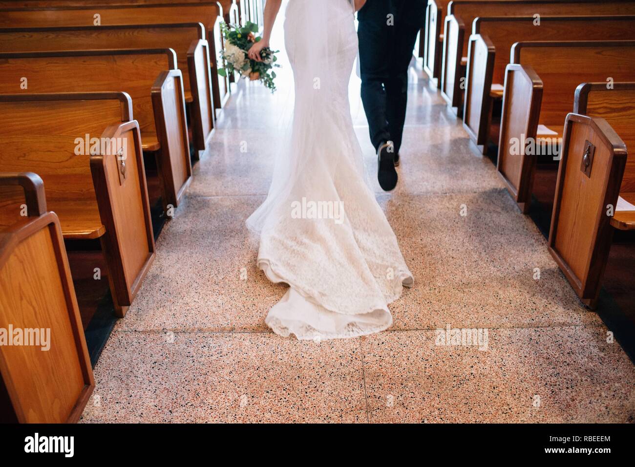 Bride walking down the aisle hires stock photography and images Alamy