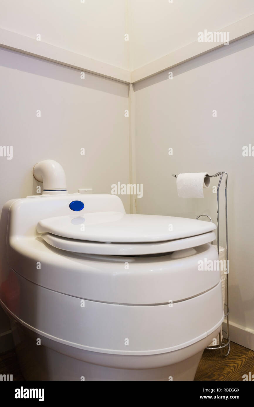 Ecological waterless composting toilet in the bathroom inside a contemporary cottage style 8 x