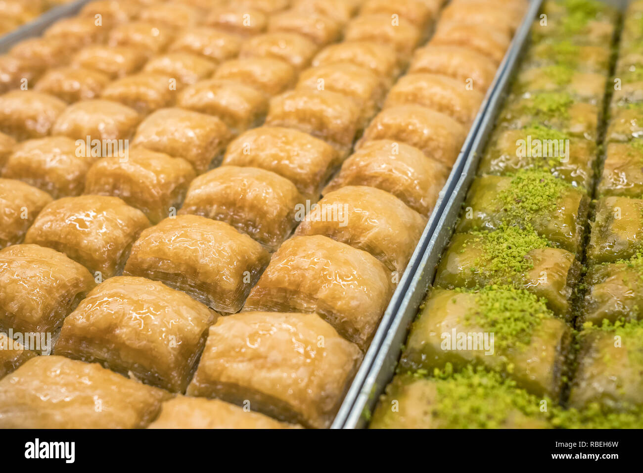 Traditional Turkish dessert Baklava close-up in the local Baklava shop in Turkey Stock Photo