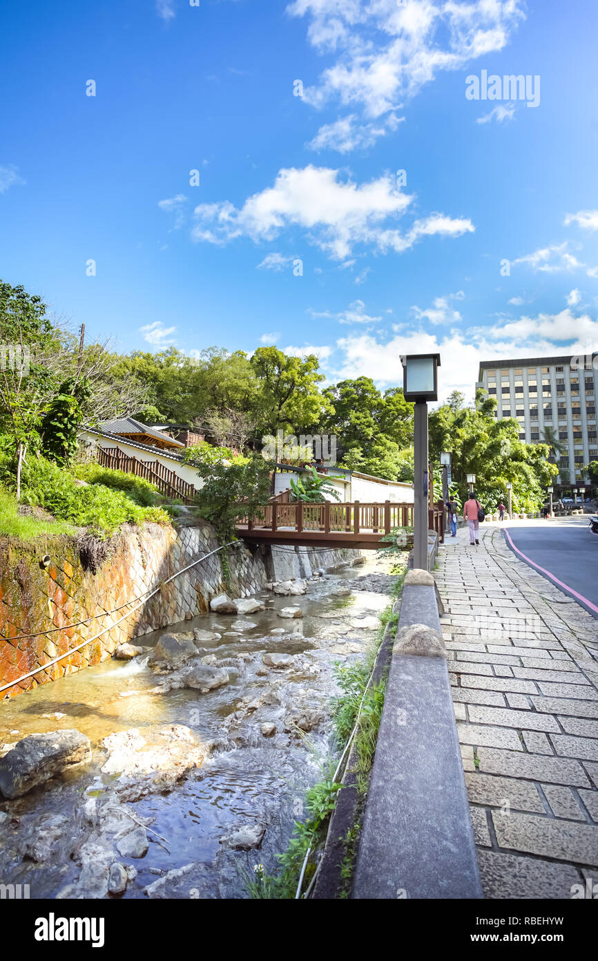 Beautiful scene of the Roadside canal in the garden, Beitou park, Taipei City, Taiwan. Stock Photo