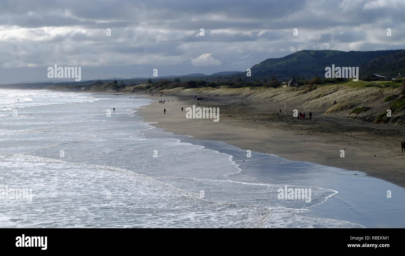 Beach under cloudy sky hi-res stock photography and images - Alamy
