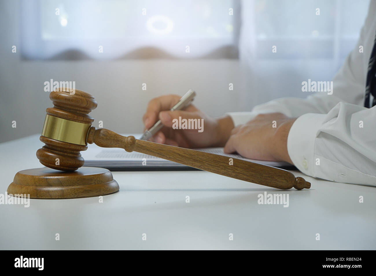 Judge gavel hammer on Lawyer desk Stock Photo - Alamy