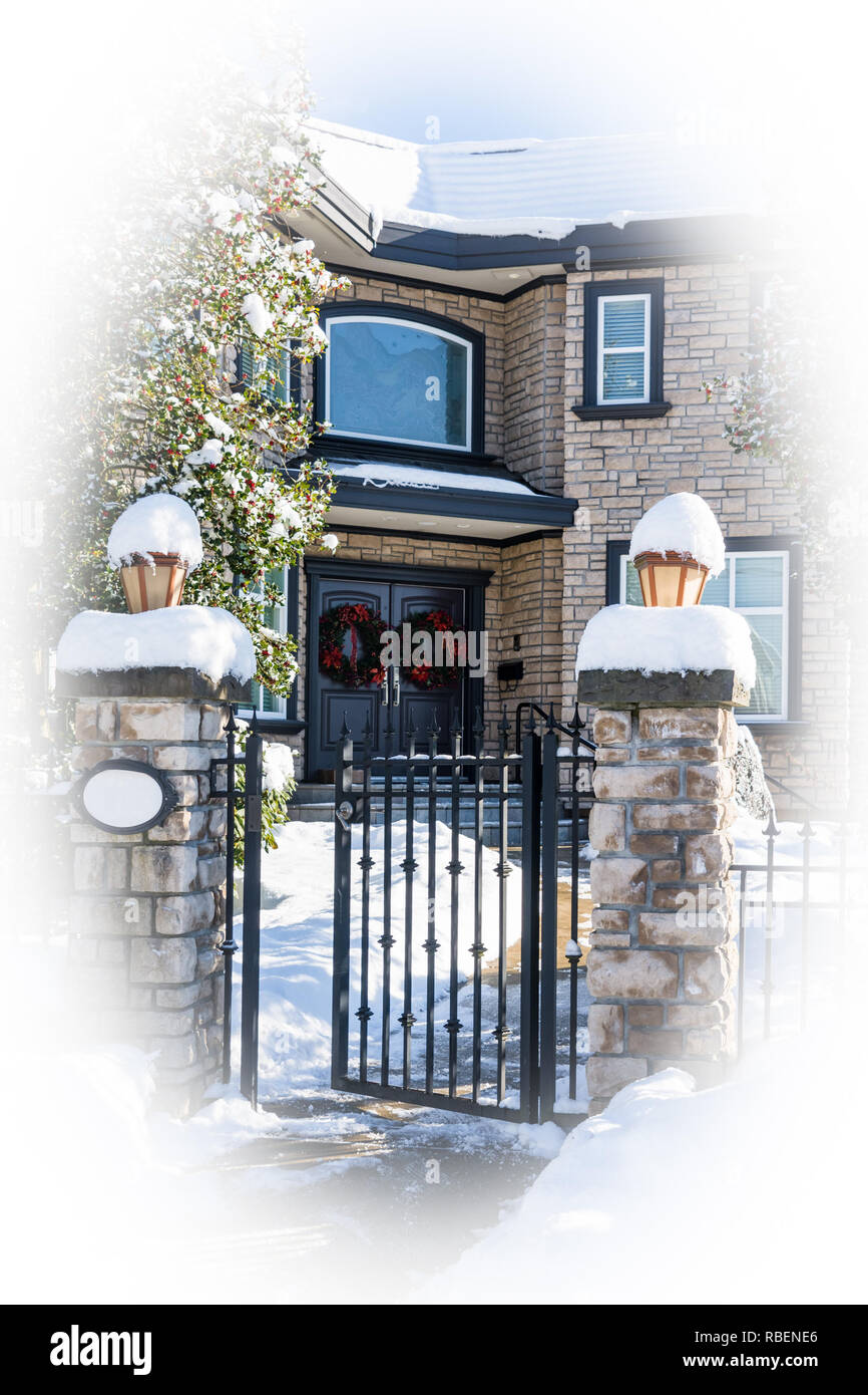 Luxury residential house entrance decorated for Christmass. White round borders Stock Photo
