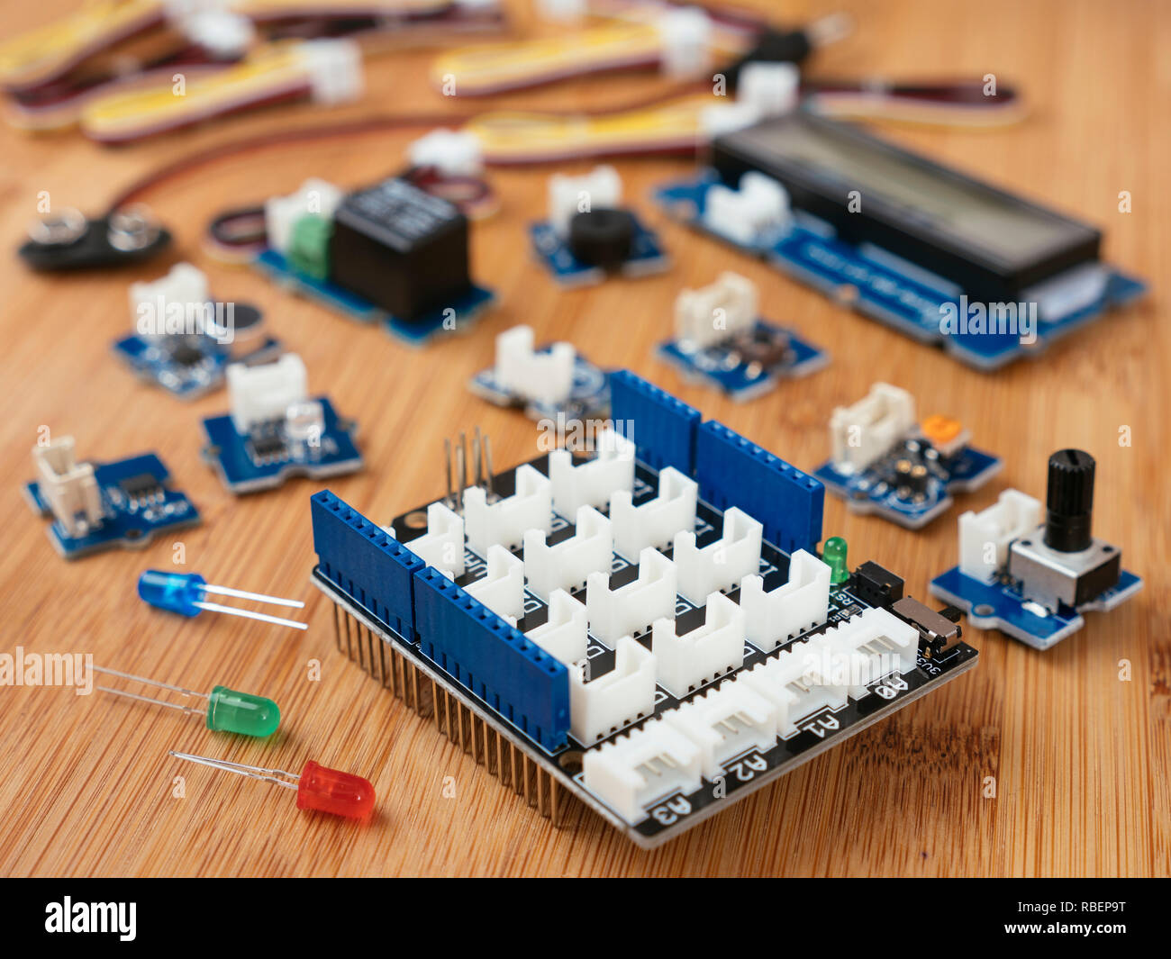 Grove module starter kit for Arduino with a selection of different modules and a base shield. Stock Photo