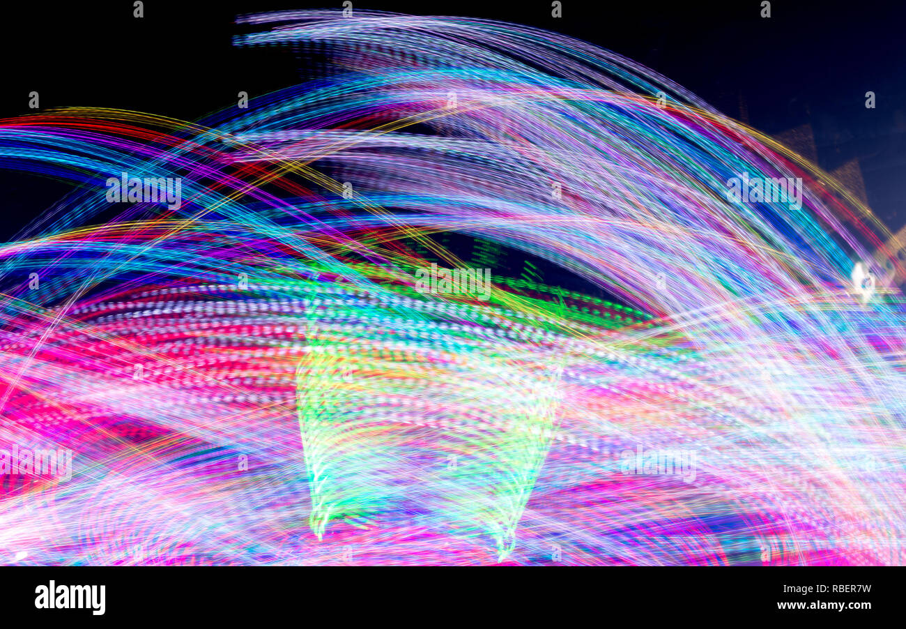 Long Exposure Of A Spinning Carnival Ride Stock Photo - Alamy