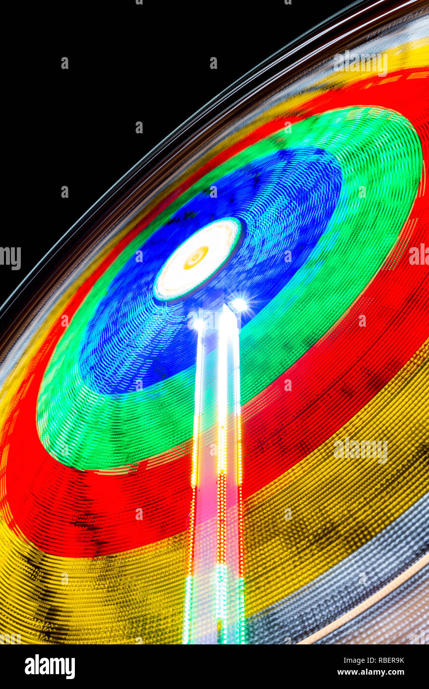 Long Exposure Of A Spinning Carnival Ride Stock Photo - Alamy