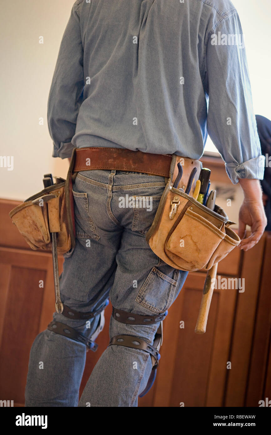 Tool belt worn by a male builder Stock Photo Alamy