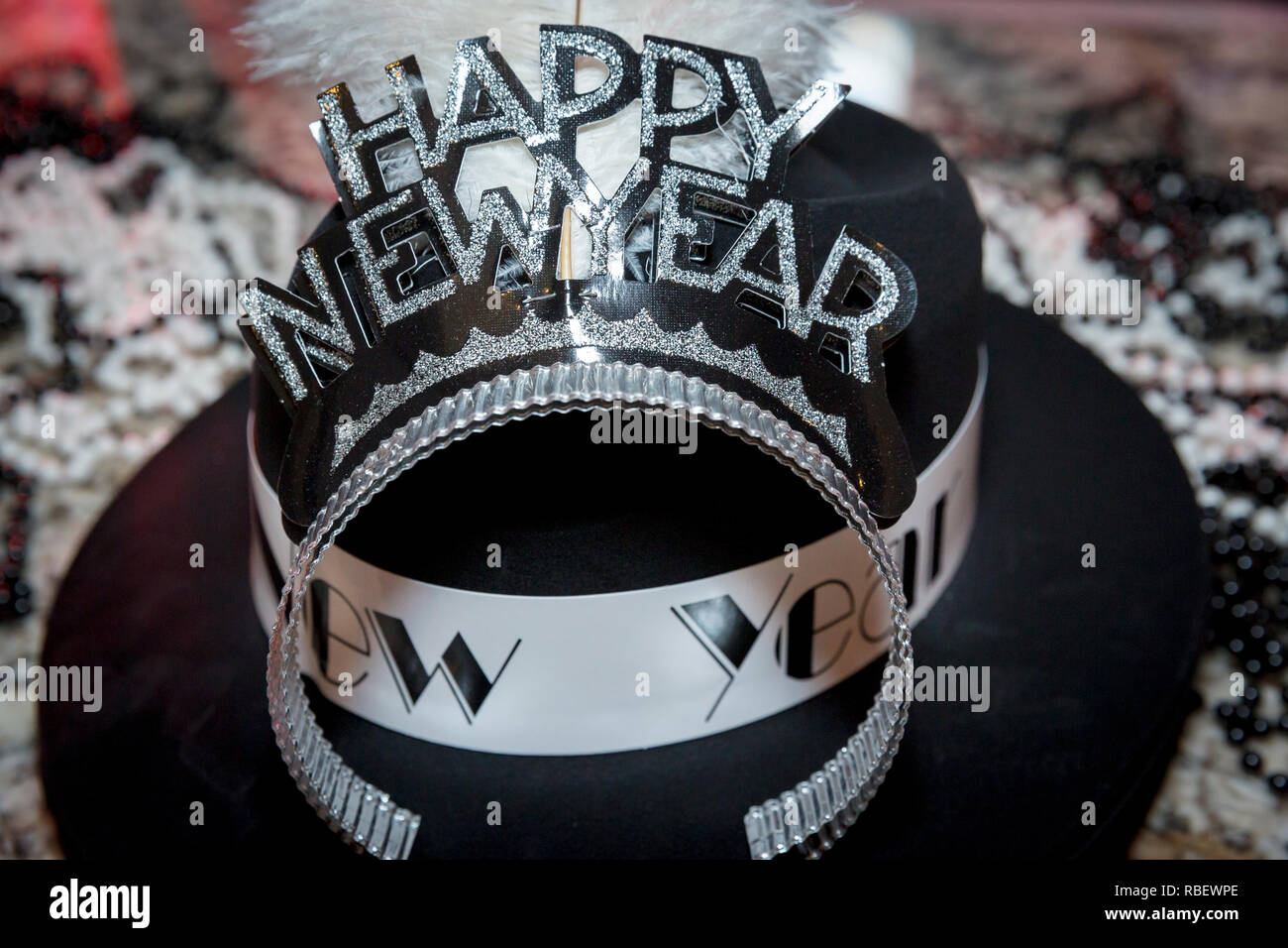 Happy New Years party top hat and headpieces. Stock Photo