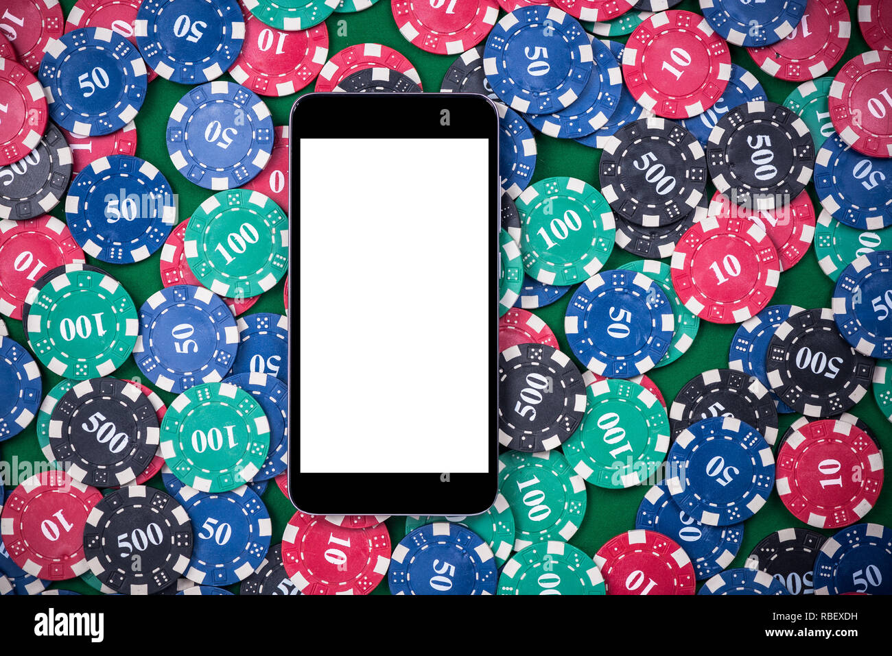 Mobile device with mock up template scrren on poker chips Stock Photo Alamy