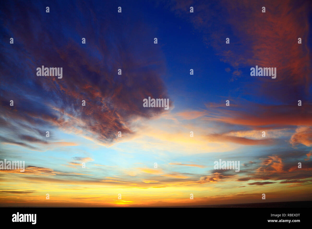 Pink, yellow, blue, dark, cloud, clouds, after sunset, sky, skies, colourful, formation, formations Stock Photo