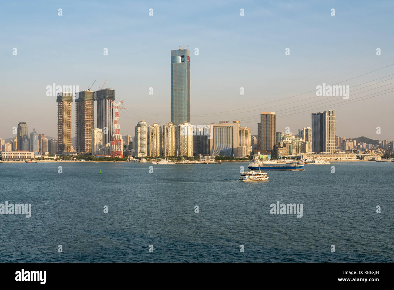 Skyline of the city of Xiamen from the sea approaching port Stock Photo ...