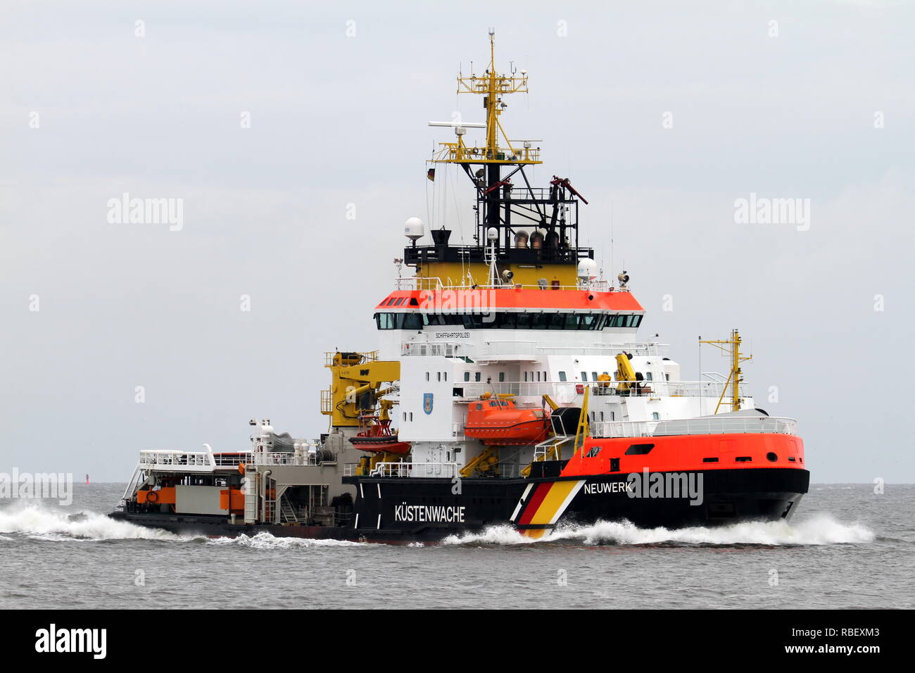 The ship of the Coast Guard Neuwerk reached the port of Cuxhaven on 9th August 2014. Stock Photo