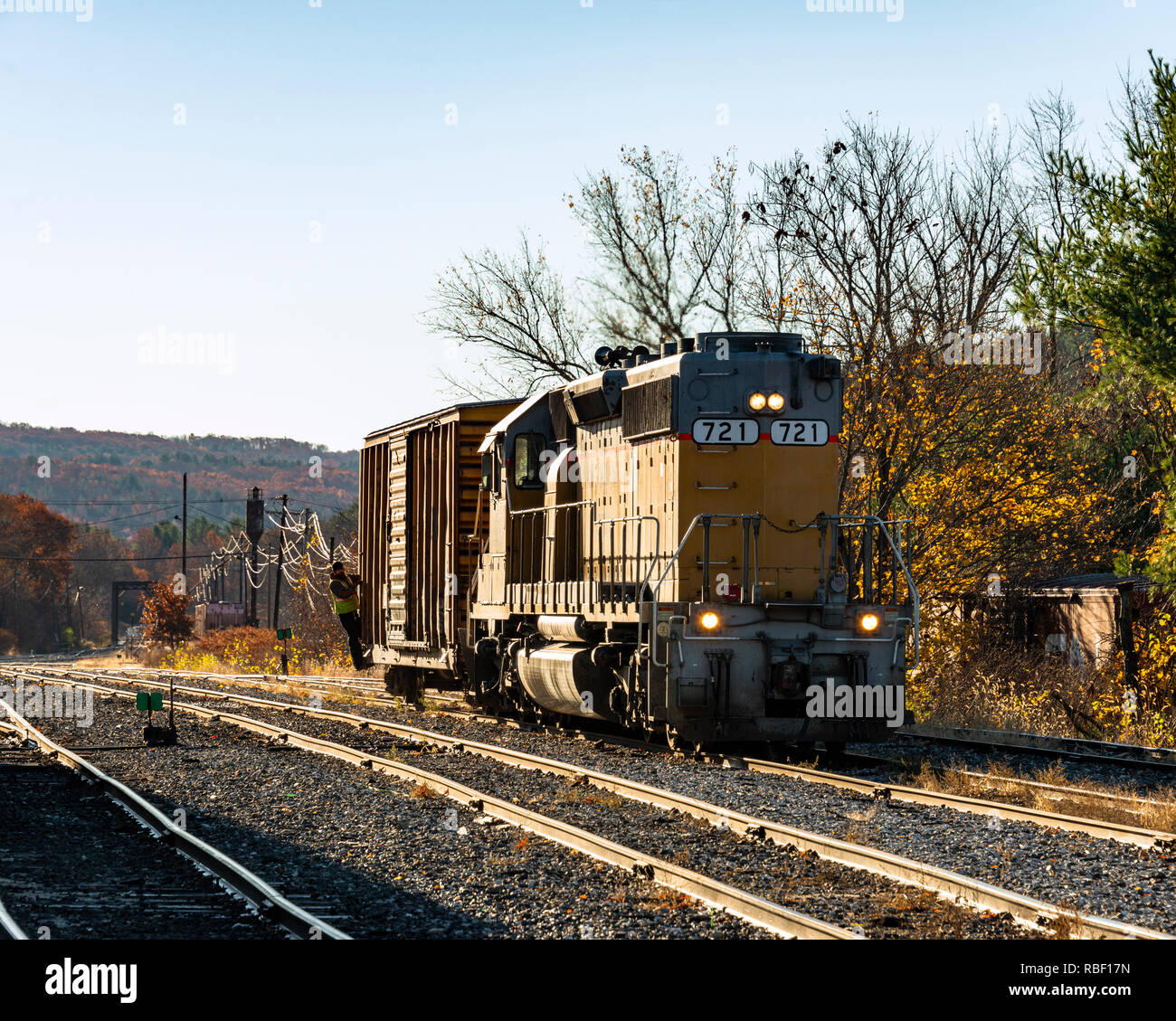 Diesel train engine moving freight cars around the yard in Palmer, MA, USA Stock Photo
