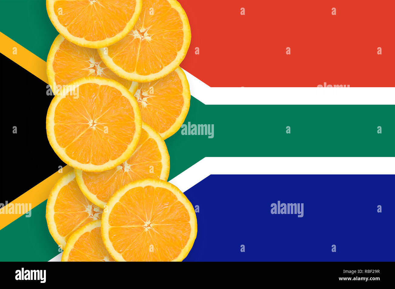 South Africa flag and vertical row of orange citrus fruit slices