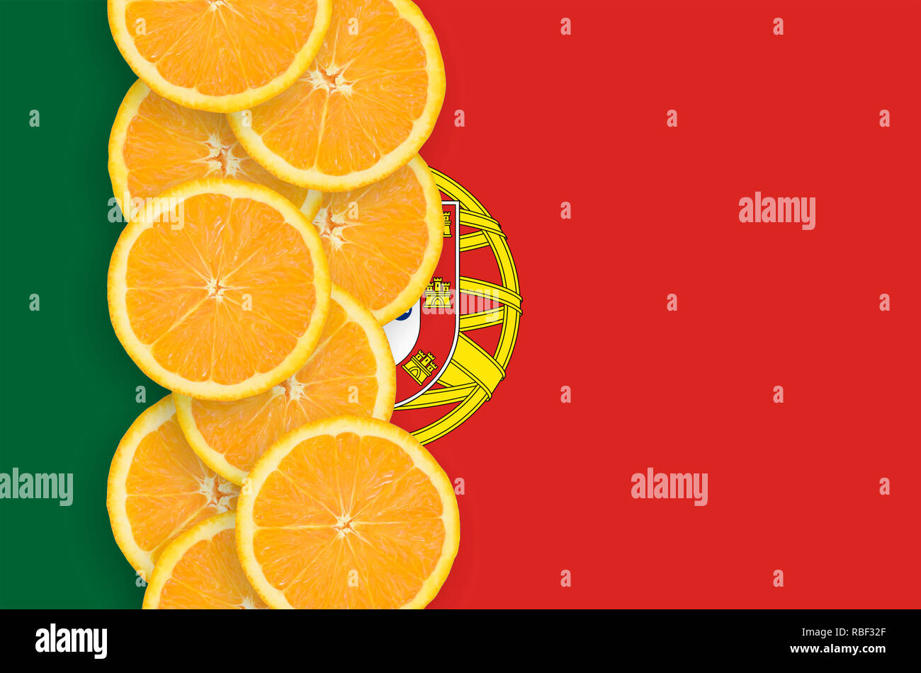 Portugal flag and vertical row of orange citrus fruit slices. Concept of growing as well as import and export of citrus fruits Stock Photo