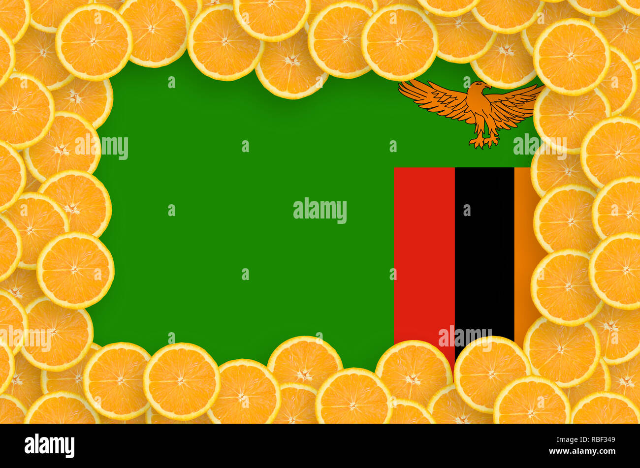 Zambia flag in frame of orange citrus fruit slices. Concept of growing