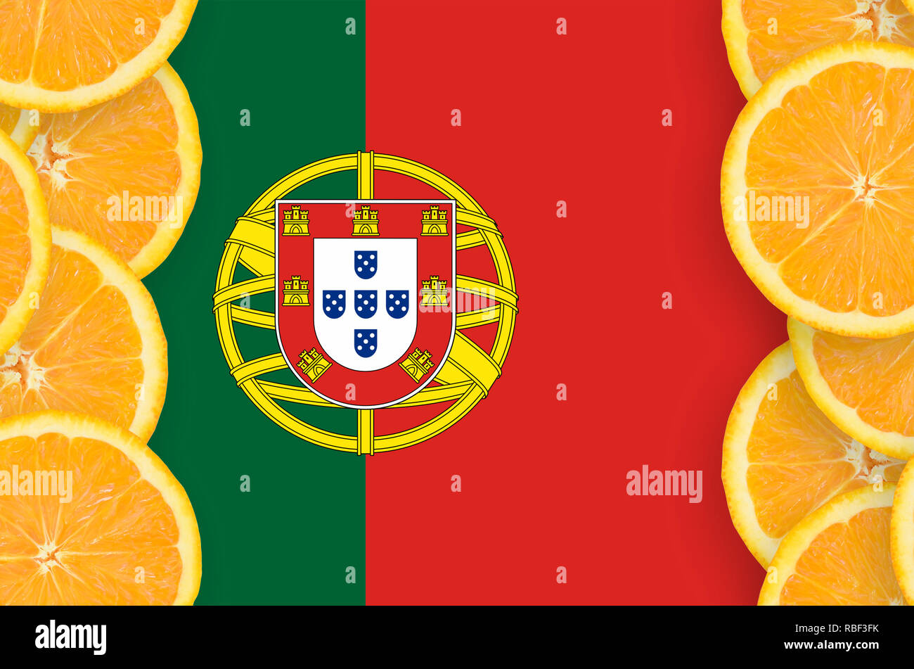 Portugal flag  in vertical frame of orange citrus fruit slices. Concept of growing as well as import and export of citrus fruits Stock Photo