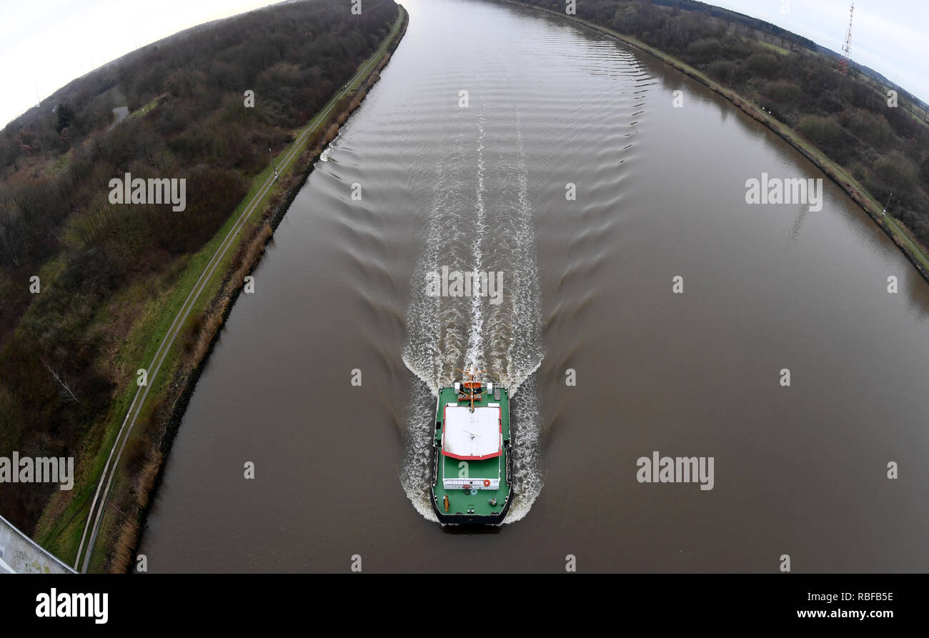 10 January 2019, Schleswig-Holstein, Grünental: The surveying ship 'Orka' sails on the Kiel Canal in the direction of the Baltic Sea (photo with Fisheye optics). The catamaran of the Waterways and Shipping Authority Brunsbüttel is daily on the canal with its three-man crew to collect data. Photo: Carsten Rehder/dpa/Alamy Live News/Alamy Live News Stock Photo