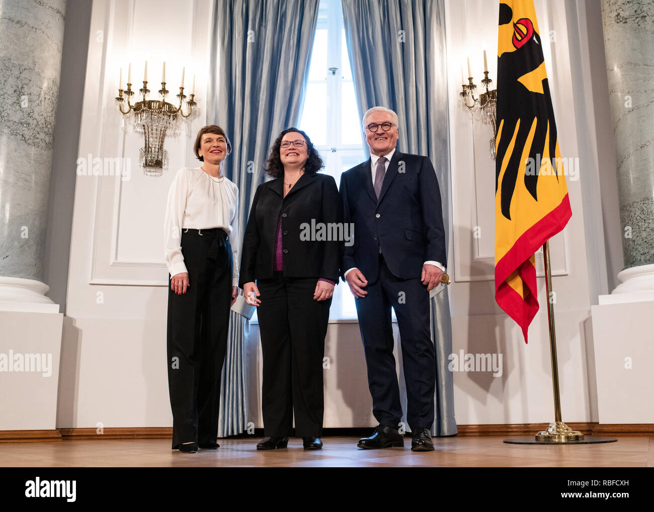 Berlin, Germany. 10th Jan, 2019. Andrea Nahles (M), chairwoman of the SPD, is welcomed by Federal President Frank-Walter Steinmeier and his wife Elke Büdenbender at the Federal President's New Year's reception in Bellevue Castle. In addition to representatives of public life, around 70 citizens from all federal states who have rendered outstanding services to the common good are invited. Credit: Bernd von Jutrczenka/dpa/Alamy Live News Stock Photo