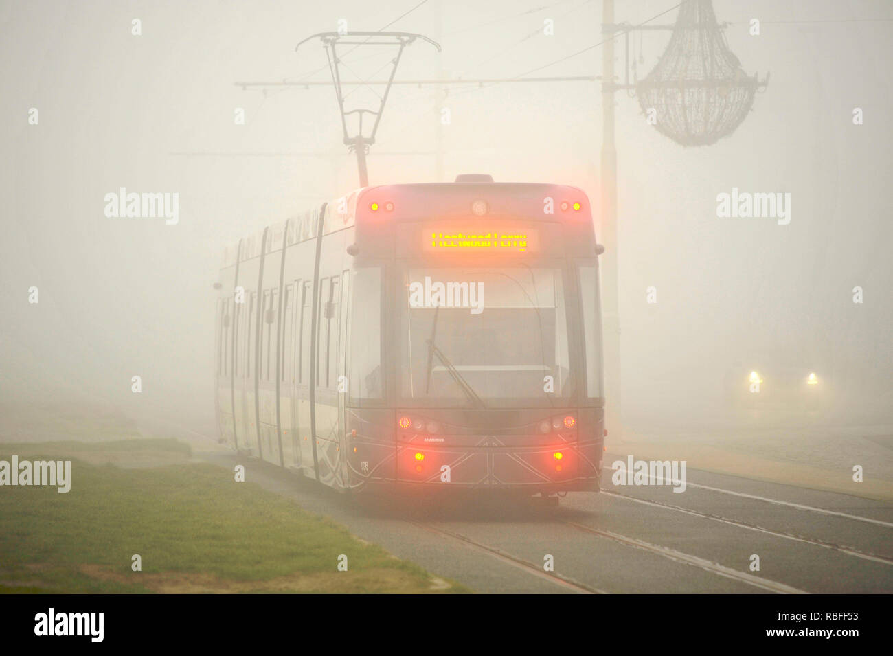 Blackpool, UK. 10th Jan, 2019. Low temperatures and low visibility on the seafront at Blackpool, Lancashire.Even the trams made slow progress through the thick fog as they made their way along the resorts promenade. Credit: kevin walsh/Alamy Live News Stock Photo
