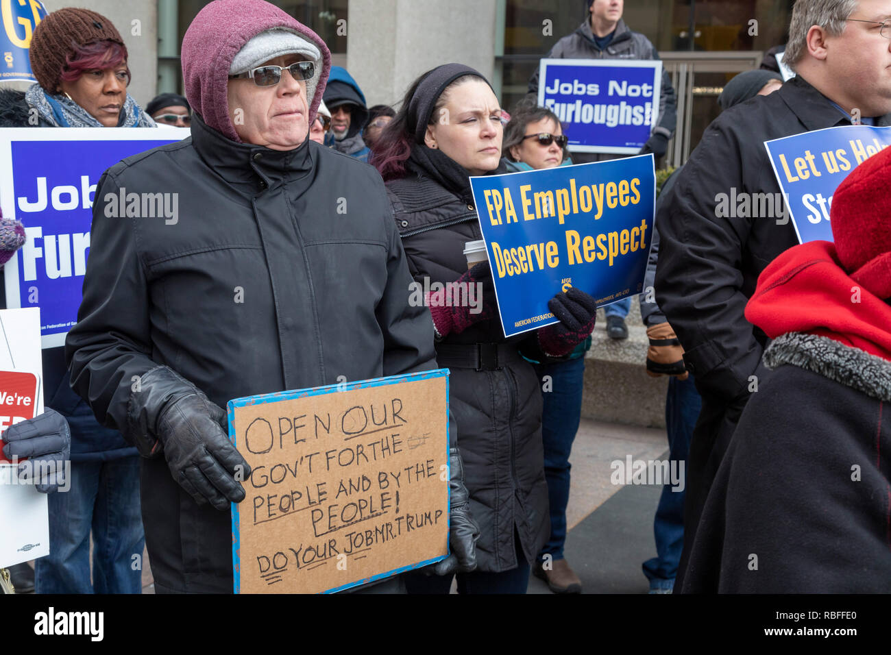 Detroit, Michigan USA - 10 January 2019 - Federal government employees rally at the federal McNamara Building to protest the partial government shutdown. The protest was led by the American Federation of Government Employees (AFGE). Many government agencies were closed after Congress would not agree to President Trump's demand for $5 billion to build a wall along the Mexican border. Credit: Jim West/Alamy Live News Stock Photo
